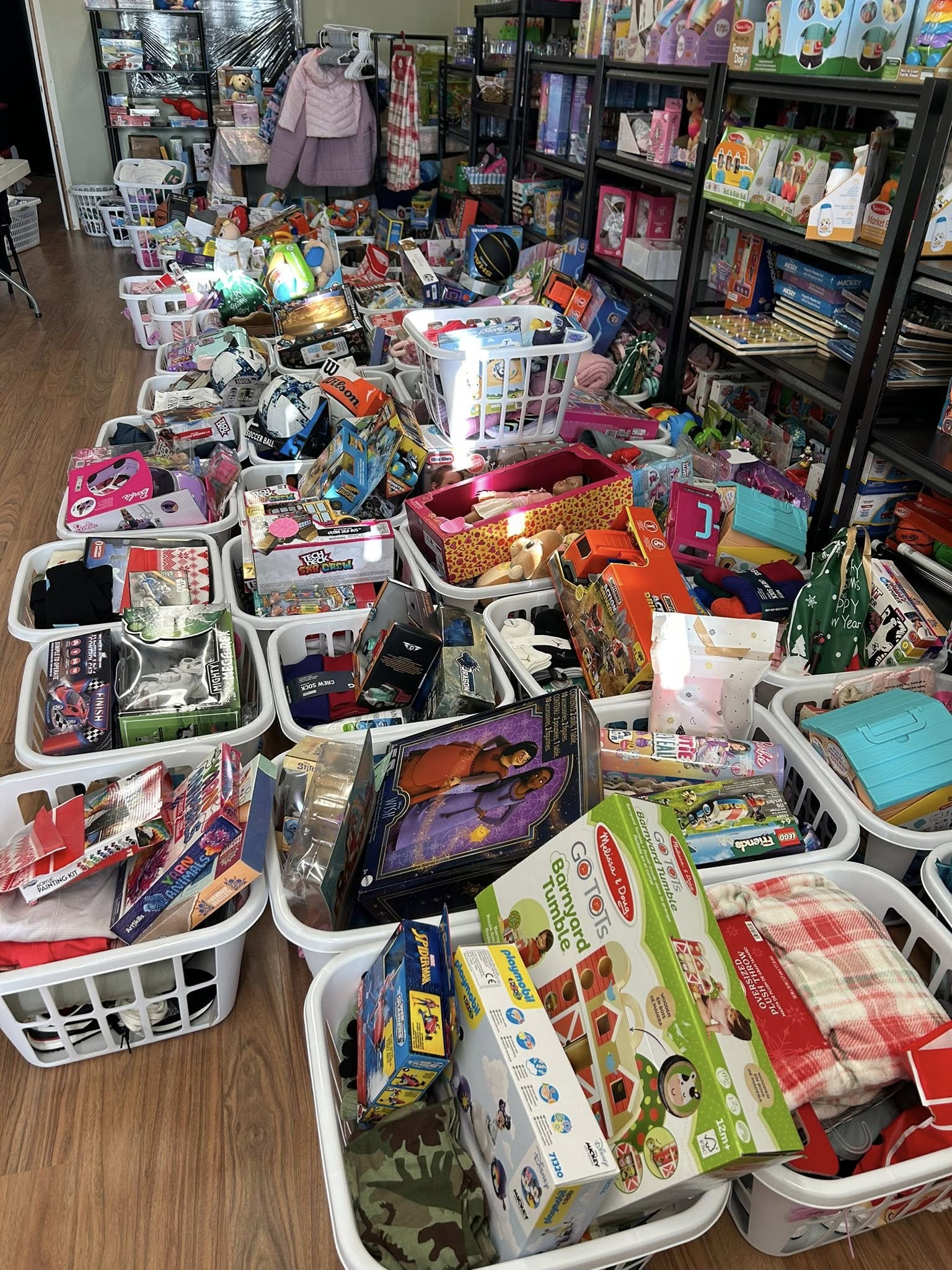 Baskets full of donated toys and gifts ready for distribution